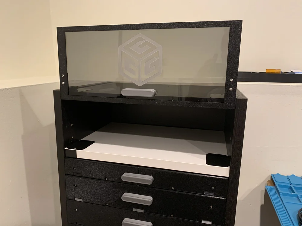 Top acrylic enclosure door open with magnetic mounting interface