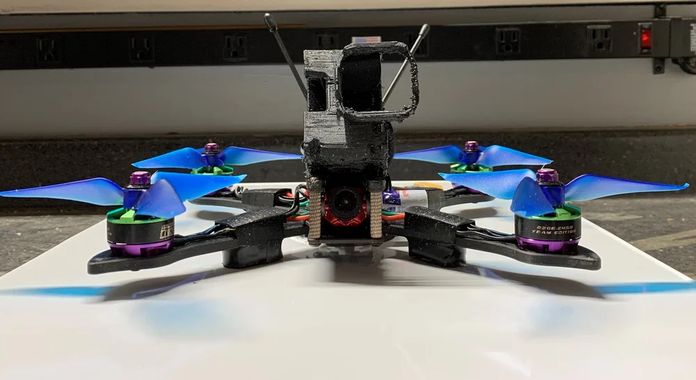 Front airframe profile showing camera mount and TPU bumper