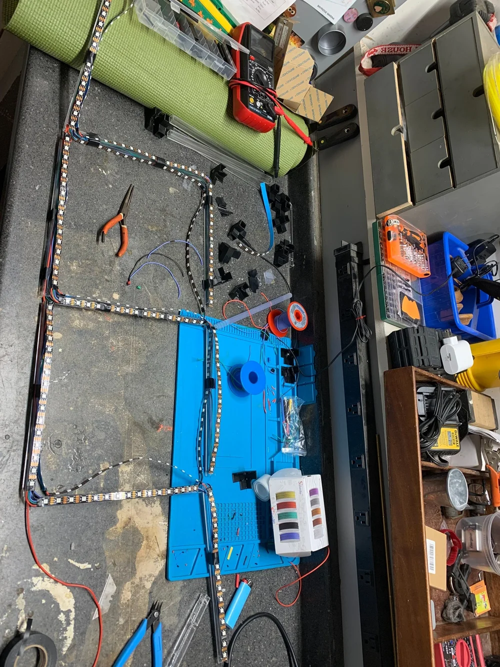 Assembly of the custom Infinity Mirror LED Hyper Cube frame and acrylic support members