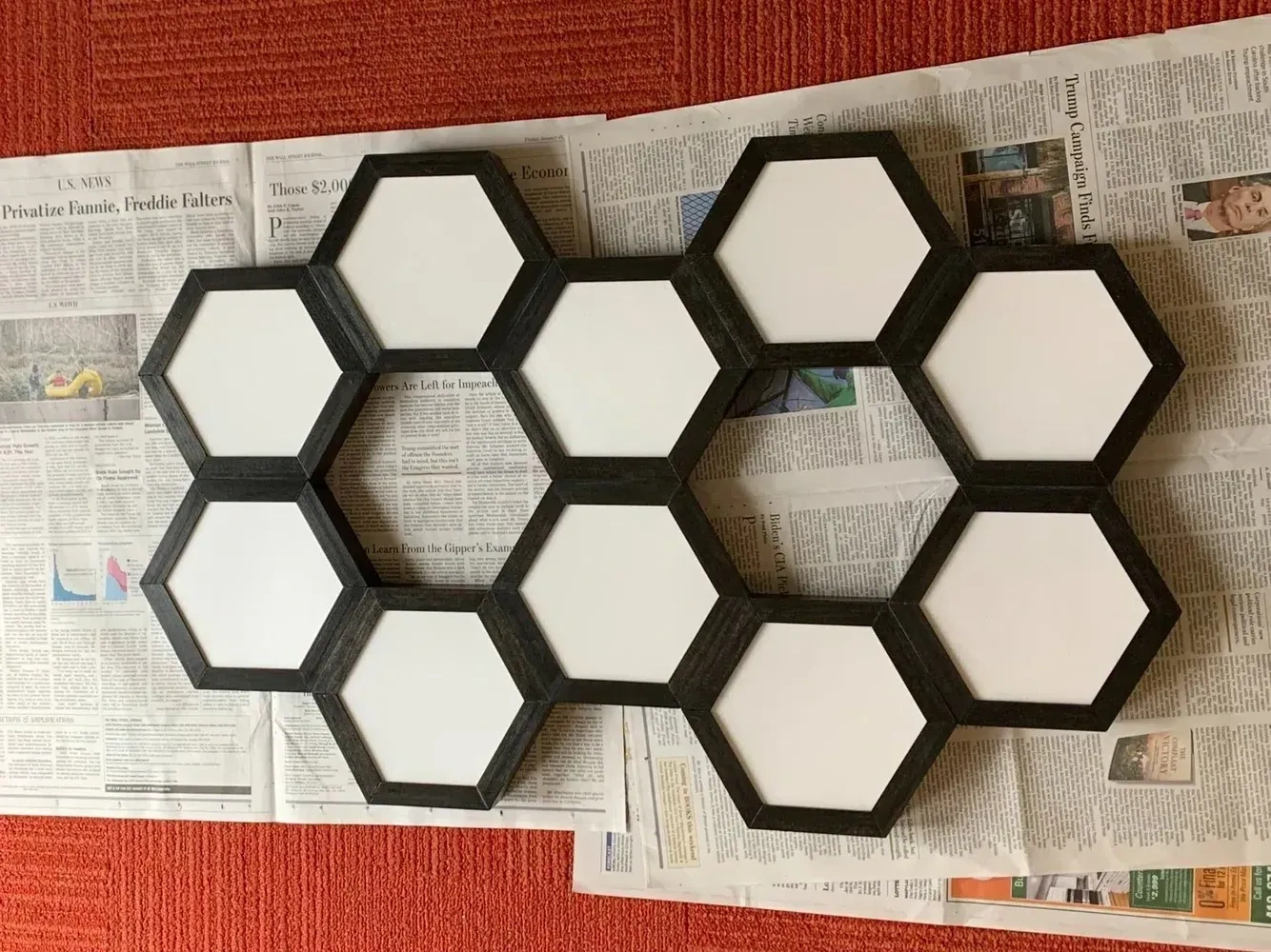 Custom hexagonal NanoLeaf LED array mounted and fully illuminated
